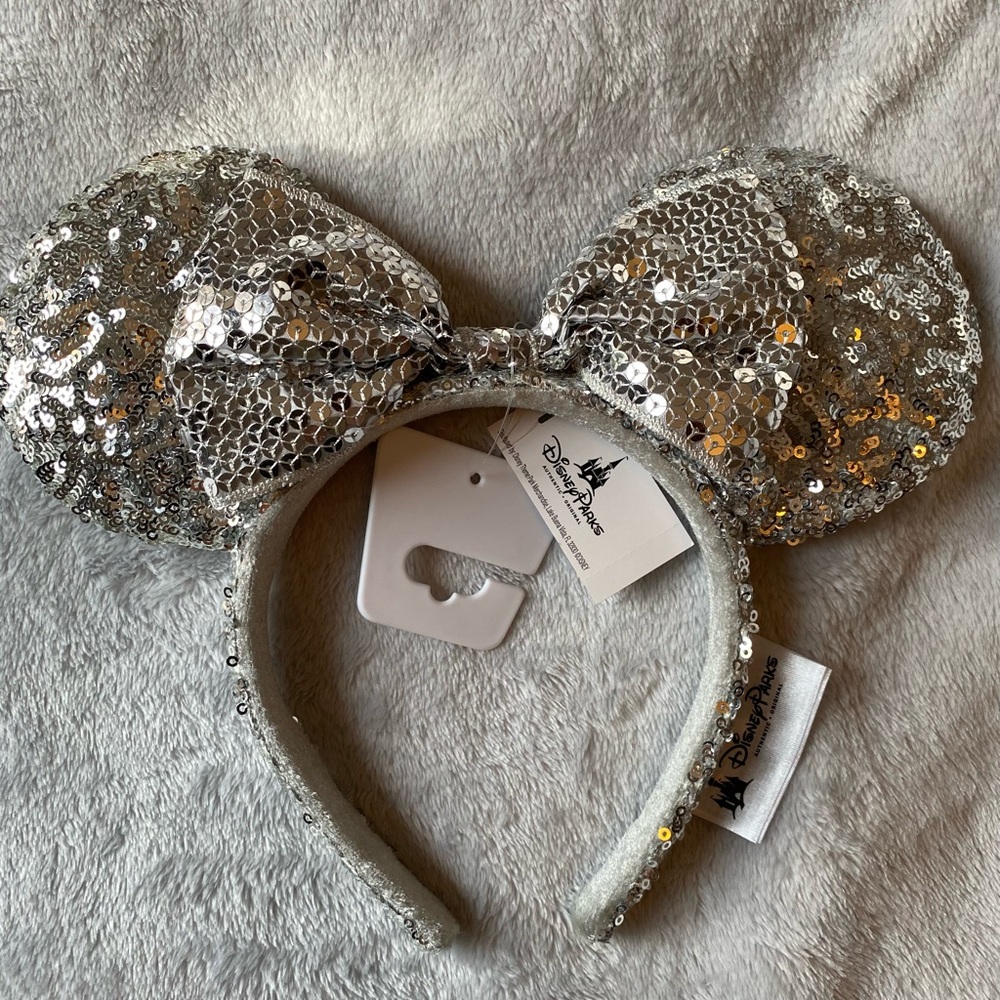 Disney Silver Minnie Ears. Never worn with tags.